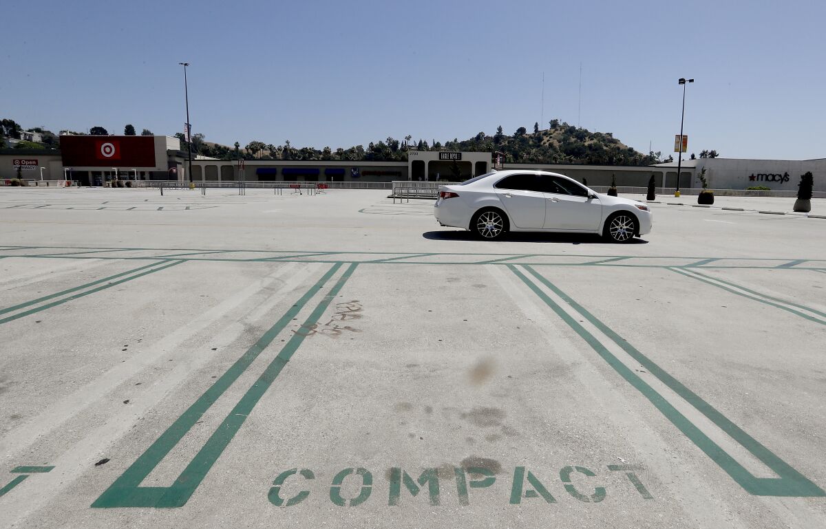 A lone car in a parking lot 