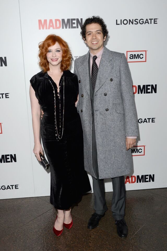 Christina Hendricks poses with her real-life husband Geoffrey Arend, who stars in ABC's "Body of Proof."