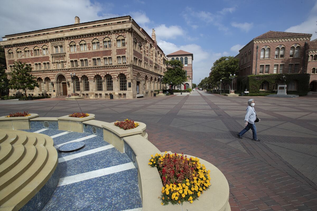 A woman makes her way on the USC campus in Los Angeles. 
