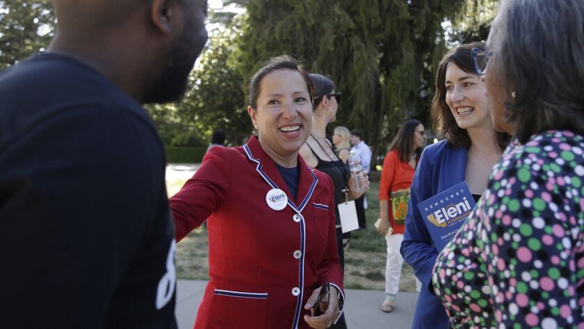 Eleni Kounalakis, center, now California's lieutenant governor-elect, talks with attendees at the Power to the Polls rally at the Capitol on June 1 in Sacramento.