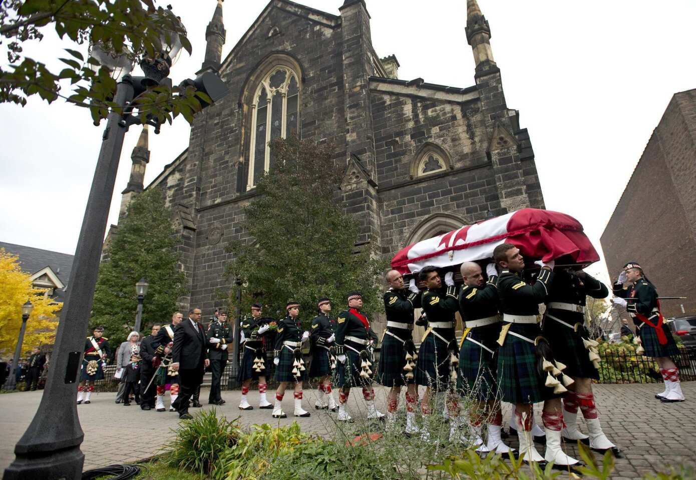 The coffin of Cpl. Nathan Cirillo is carried by pallbearers at his regimental funeral service in Hamilton, Ontario