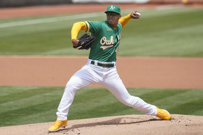 Oakland Athletics' Jesus Luzardo pitches against the Baltimore Orioles during the first inning of a baseball game in Oakland, Calif., Saturday, May 1, 2021. (AP Photo/Jeff Chiu)