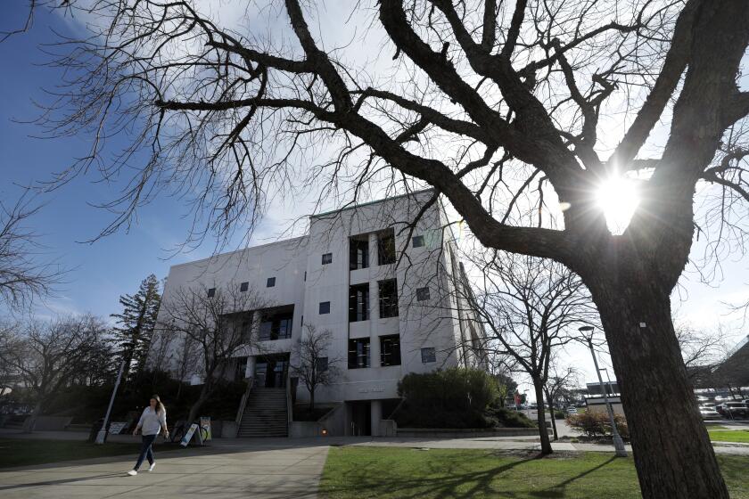 ROCKLIN, CA -- FEBRUARY 21, 2020: The Auburn Area Democratic Club does voter registration booths on the Sierra College campus in Rocklin every Wednesday. There is an effort to woo young Democratic voters in conservative Placer County. (Myung J. Chun / Los Angeles Times)