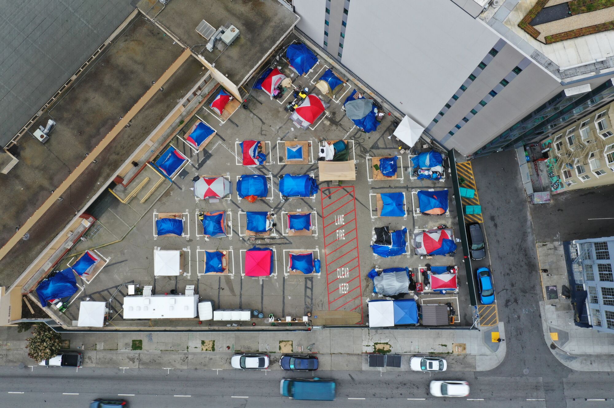 Aerial view of tents in a city lot
