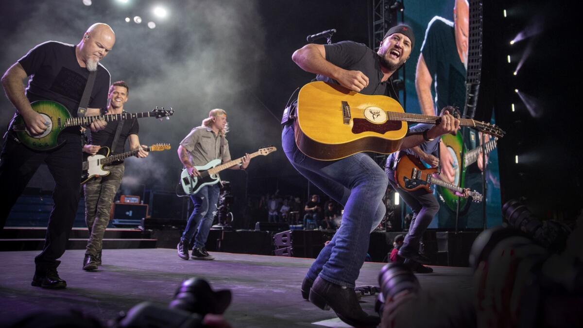 Luke Bryan and his band headline Friday's opening day of Stagecoach, the world's biggest country music festival.