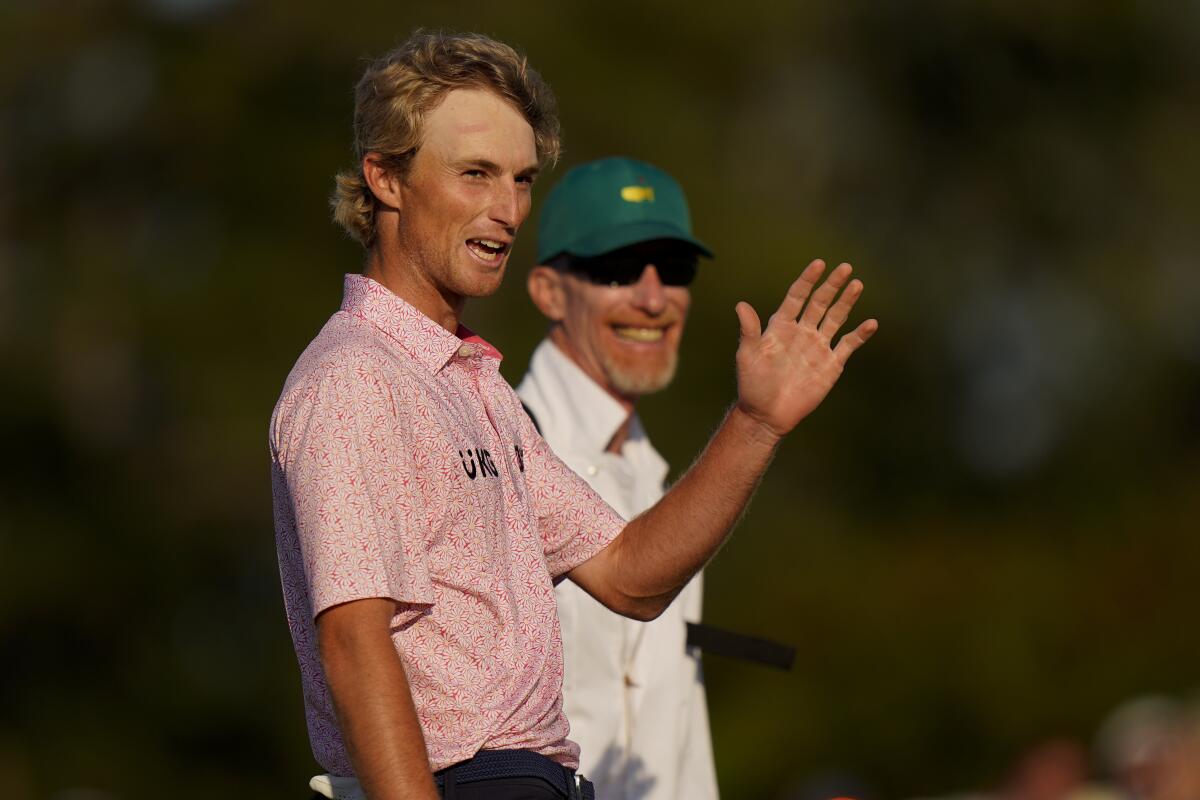 Will Zalatoris waves after putting on the 18th hole during the final round of the Masters golf tournament on Sunday, April 11, 2021, in Augusta, Ga. (AP Photo/Matt Slocum)