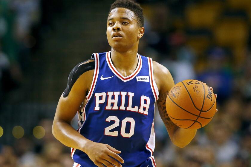 In this Oct. 9, 2017, photo, Philadelphia 76ers guard Markelle Fultz during the first quarter of a preseason NBA basketball game against the Boston Celtics in Boston. Fultz gets to start the next chapter of his career in a familiar spot. The No. 1 pick in the draft will make his NBA debut for the 76ers on Wednesday night, Oct. 18, at the Washington Wizards, about a half-hour from home. (AP Photo/Winslow Townson)