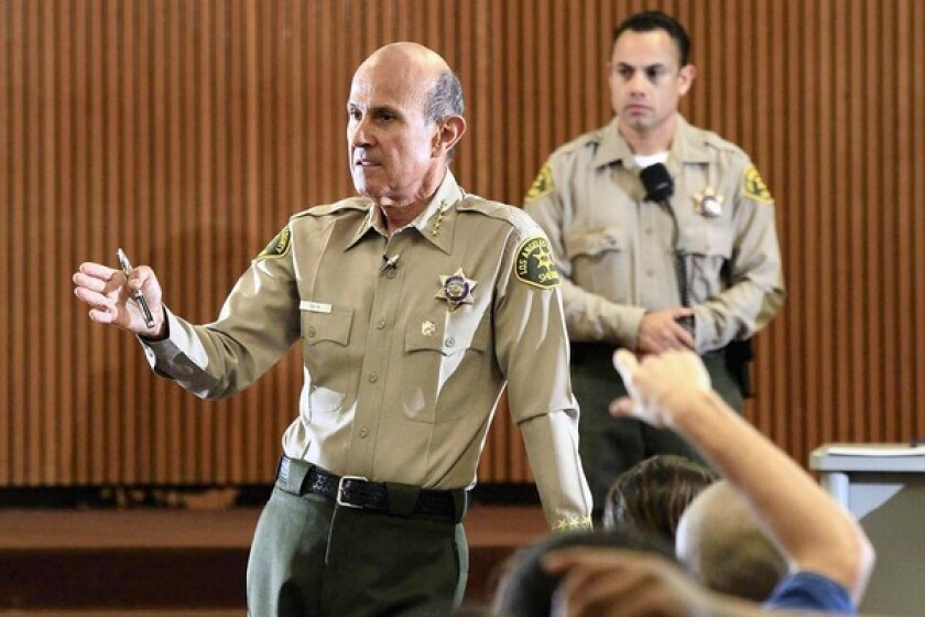 Los Angeles County Sheriff Lee Baca meets with inmates to listen to their complaints at Men's Central Jail in Los Angeles. He said he would return to Men’s Central Jail next Saturday to continue the dialogue, and would hold similar gatherings in other county jails.