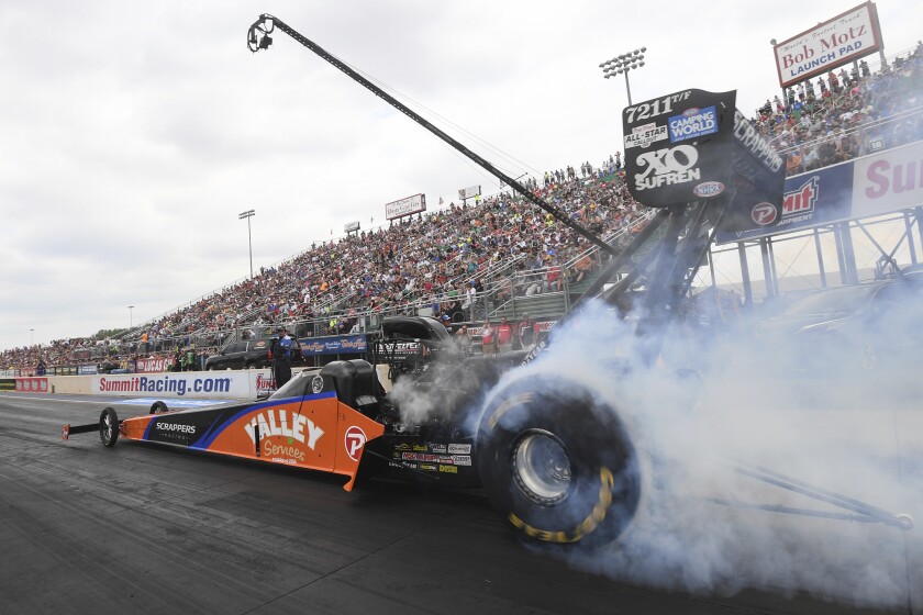 In this photo provided by the NHRA, Top Fuel's Mike Salinas wins for the fourth time of the season in his dragster to win at the Summit Racing Equipment NHRA Nationals at Summit Racing Equipment Motorsports Park in Norwalk, Ohio, Sunday, June 26, 2022. (Marc Gewertz/NHRA via AP)