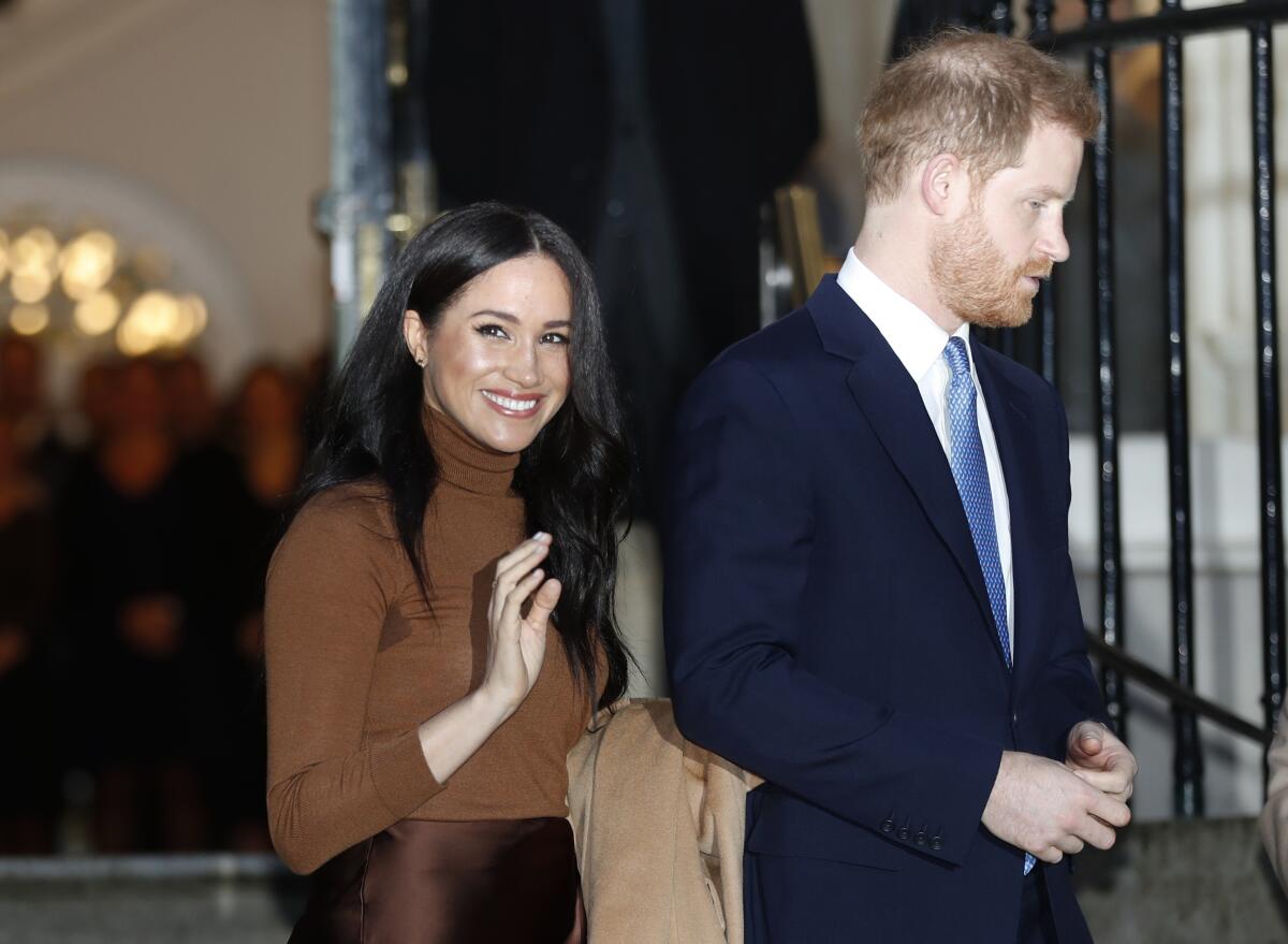 Britain's Prince Harry and Meghan, Duchess of Sussex, leave after visiting Canada House in London last week after their recent stay in Canada.