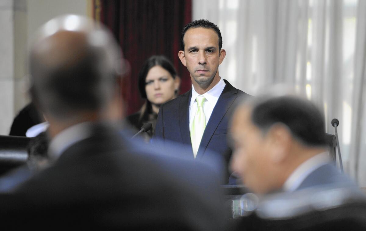 L.A. Councilman Mitchell Englander, who is running for L.A. County supervisor, listens during a Dec. 1, 2015, meeting about the gas leak near Porter Ranch.