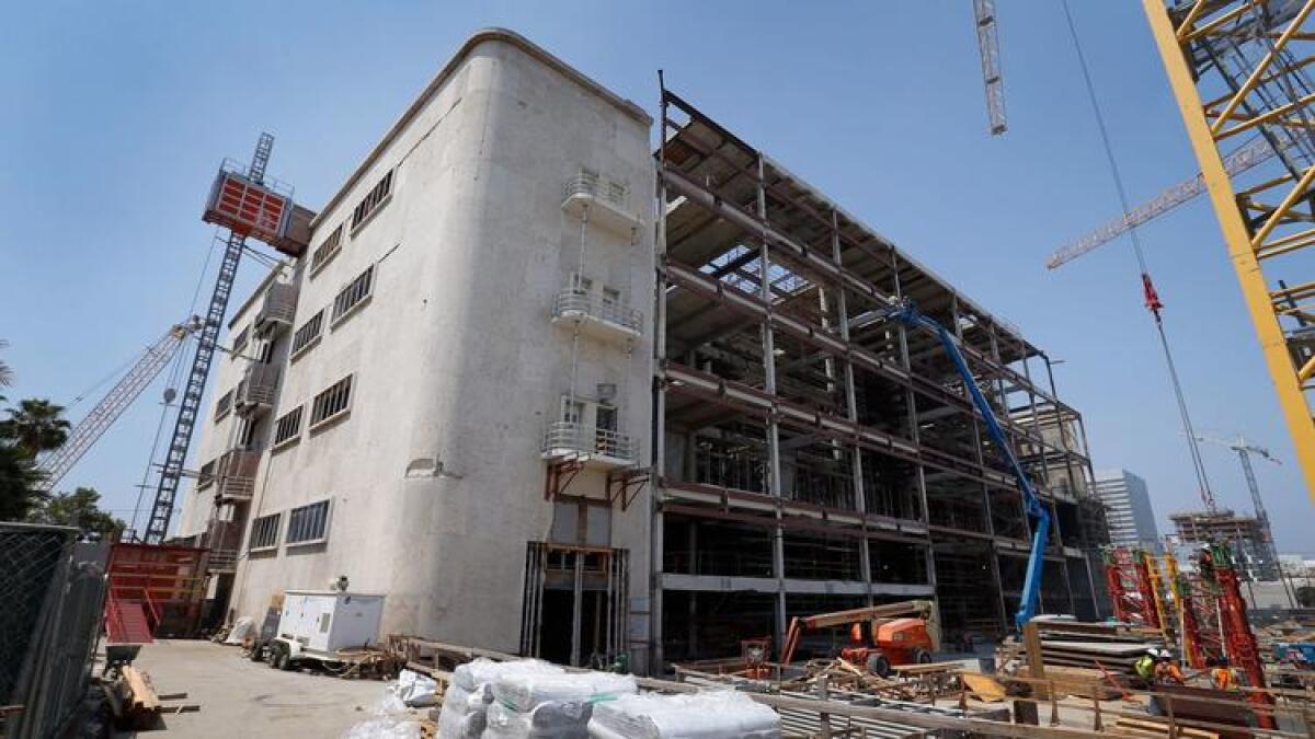 Construction is underway at the site of the future Academy Museum of Motion Pictures at the corner of Wilshire Boulevard and Fairfax Avenue.