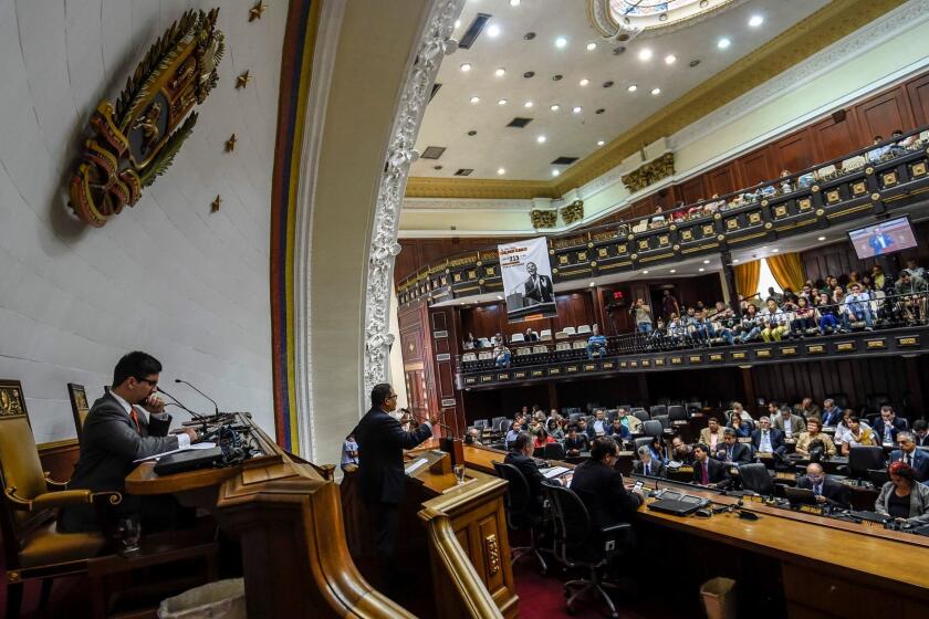 The First Vice-President of the Venezuelan National Assembly Freddy Guevara (L), attends a session at the National Assembly in Caracas on August 19, 2017. Venezuela's new pro-government constitutional authority declared Friday it was seizing power from the opposition-led legislature, tightening President Nicolas Maduro's grip on the country in defiance of international outrage. It was the latest maneuver in a deadly political crisis that has seen Maduro branded a dictator by opponents, whom he in turn accuses of plotting with the United States to overthrow him. The opposition-led National Assembly rejected the move. / AFP PHOTO / Juan BARRETOJUAN BARRETO/AFP/Getty Images ** OUTS - ELSENT, FPG, CM - OUTS * NM, PH, VA if sourced by CT, LA or MoD **