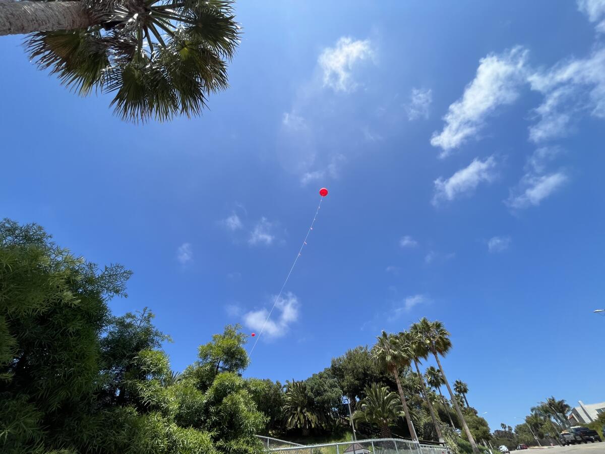 Residents have been asking questions about the balloons at Santa Fe Christian Schools.
