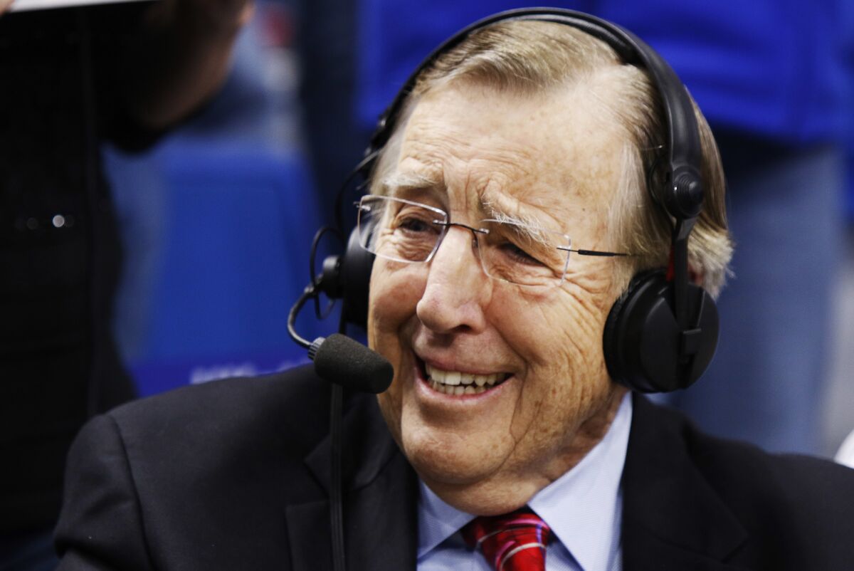 Veteran broadcaster Brent Musburger prepares for his last broadcast prior to an NCAA college basketball game.