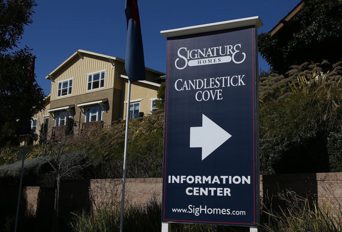 A sign advertises Candlestick Cove, a new housing community in San Francisco. California home prices shot up almost 26% in May compared to the same month in 2012, DataQuick said.