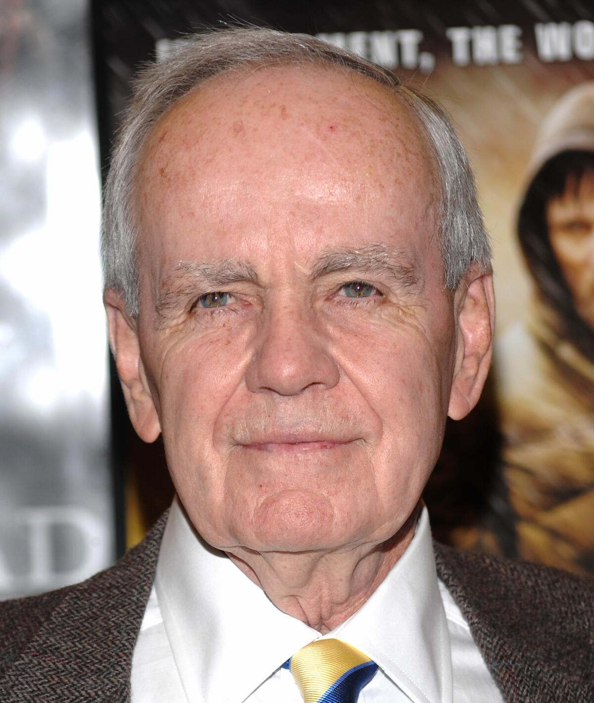 Cormac McCarthy in a suit and tie. 