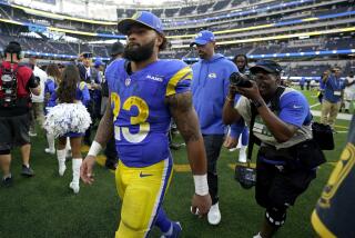 Rams running back Kyren Williams (23) walks off the field following a win over the Arizona Cardinals.