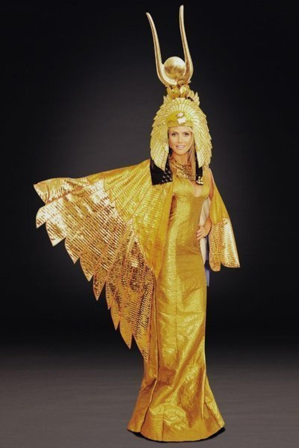 Heidi Klum models the elaborate Cleopatra costume she had planned to wear for Halloween before Hurricane Sandy forced a cancellation.