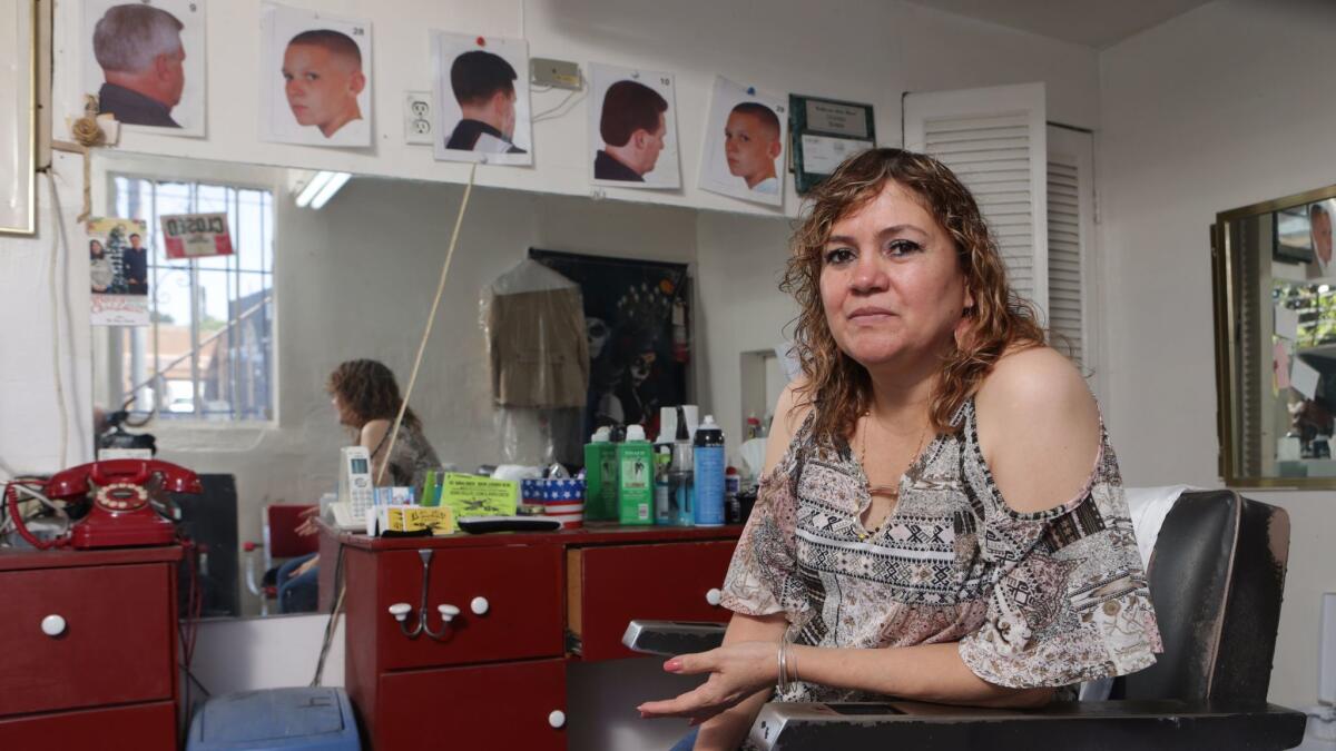 Cecilia Rios at her Echo Park Barber Shop in Los Angeles.