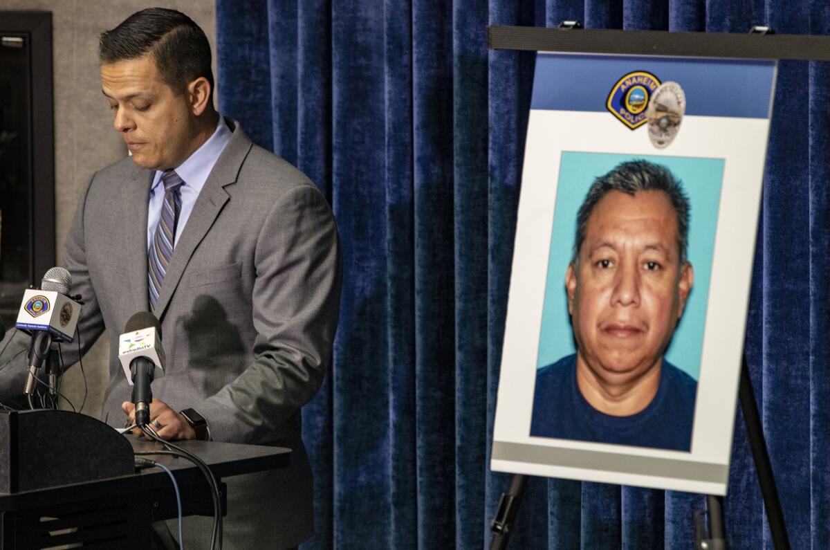 Anaheim police Sgt. Shane Carringer announces the arrest of Pastor Rolando Fuentes, 53, on sexual assault charges on Friday.