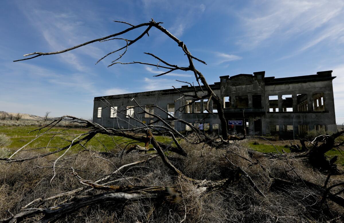 The ruins of Hanford High School still stand decades after the government purchased the town. More photos