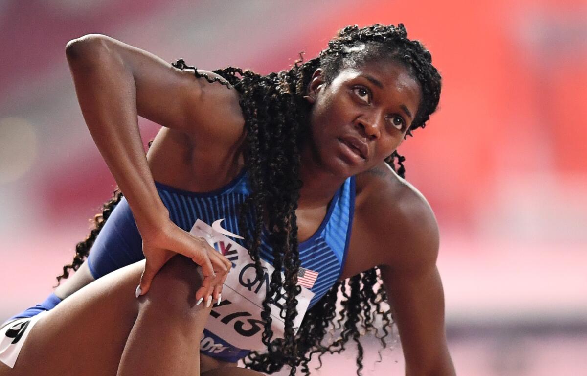 Kendall Ellis reacts after competing in a women's 400-meter heat at the IAAF Athletics World Championships in Qatar on Monday.