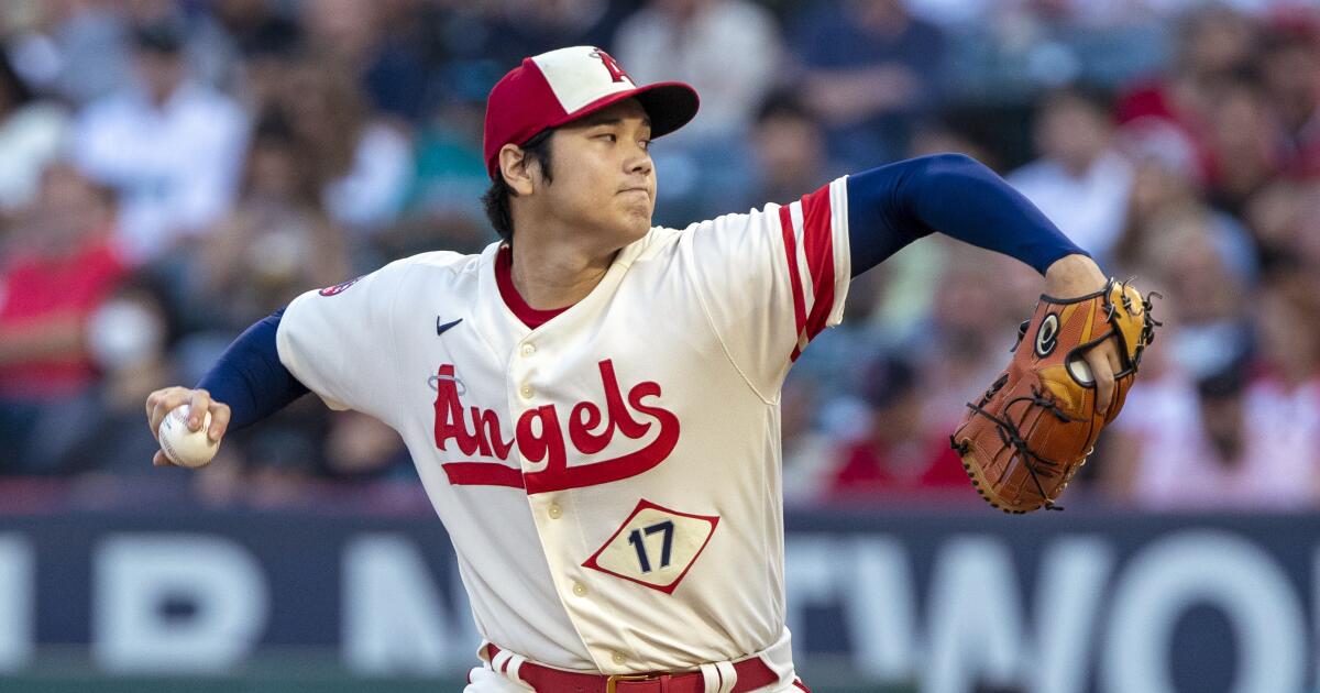 Los Angeles Angels' Shohei Ohtani wears an elbow brace during base running  drills before the Major League Baseball game against the Seattle Mariners  at Angel Stadium in Anaheim, California, United States, April