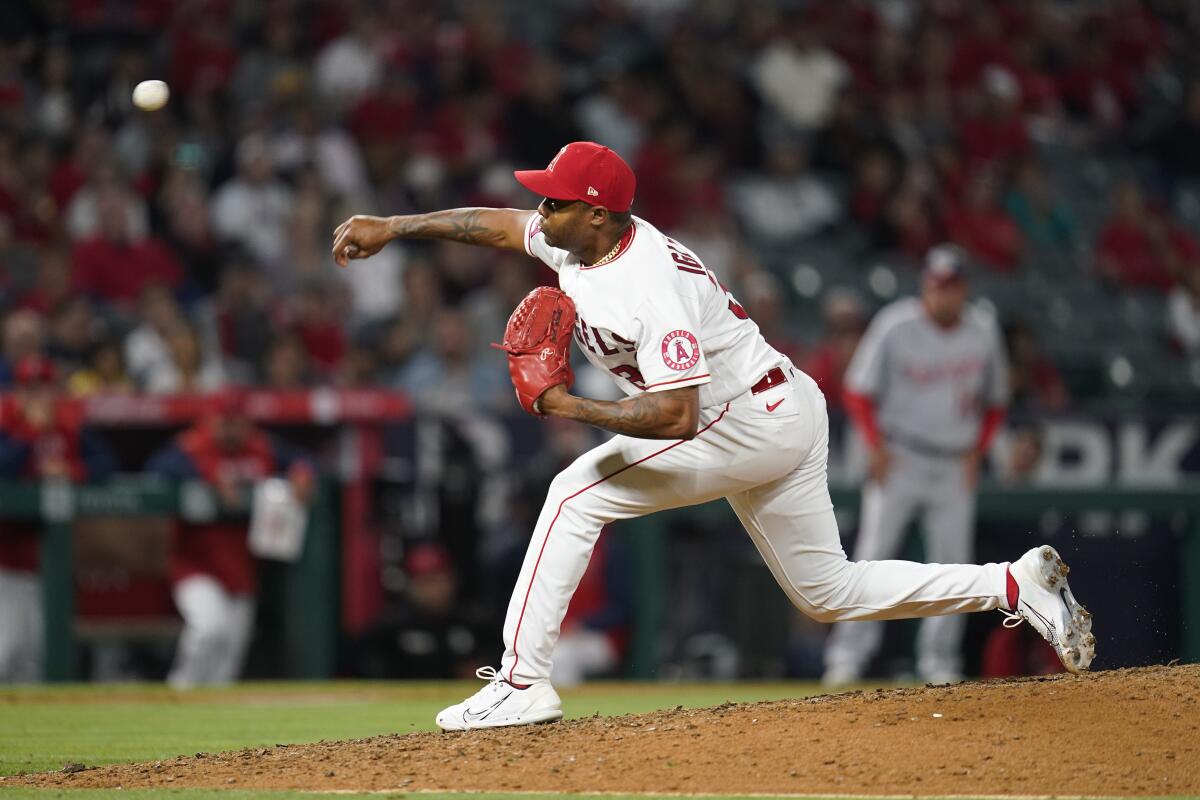 Angels' Raisel Iglesias, pitching against the Nationals on May 6, has converted 15 of 17 save opportunities this season. 