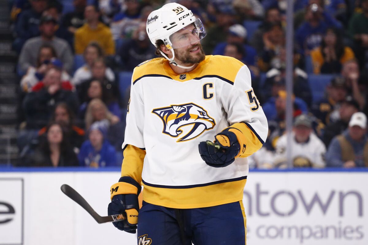 Nashville Predators defenseman Roman Josi (59) argues a call during the second period of the team's NHL hockey game against the Buffalo Sabres, Friday, April 1, 2022, in Buffalo, N.Y. (AP Photo/Jeffrey T. Barnes)