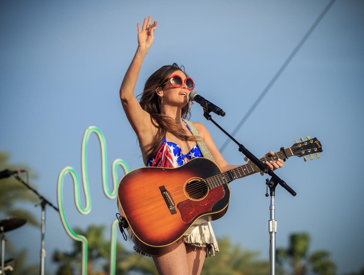 Kacey Musgraves, shown performing in April at the Stagecoach Country Music Festival in Indio, Calif., says country radio needs more females represented.