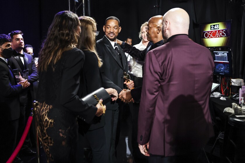 Will Smith holds his Oscar for best actor for 'King Richard'