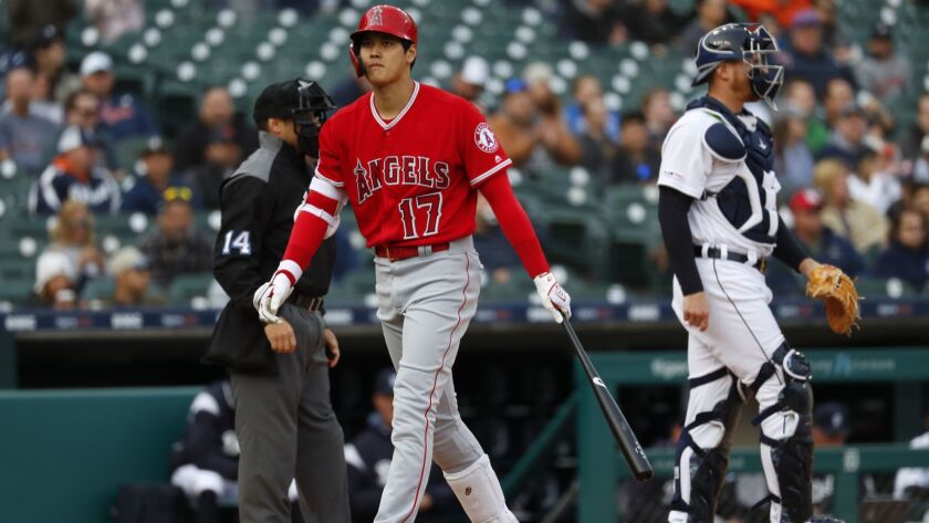 Angels’ Shohei Ohtani walks to the dugout after striking out against the Detroit Tigers in the first inning on Wednesday in Detroit.