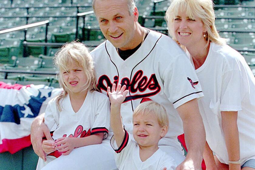 Baltimore shortstop Cal Ripken Jr. stands with wife Kelly, daughter Rachel and son Ryan in 1995.
