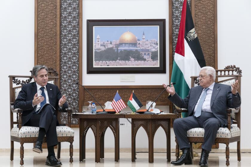 Secretary of State Antony Blinken listens during a joint statement with Palestinian President Mahmoud Abbas, Tuesday, May 25, 2021, in West Bank city of Ramallah. (AP Photo/Alex Brandon, Pool)