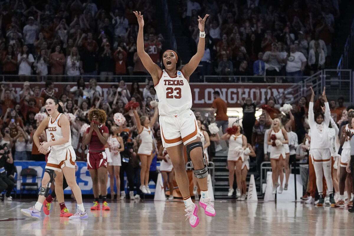 Texas forward Aaliyah Moore (23) celebrates after the team's win over Alabama in a second-round college basketball game in the women's NCAA Tournament in Austin, Texas, Sunday, March 24, 2024. (AP Photo/Eric Gay)