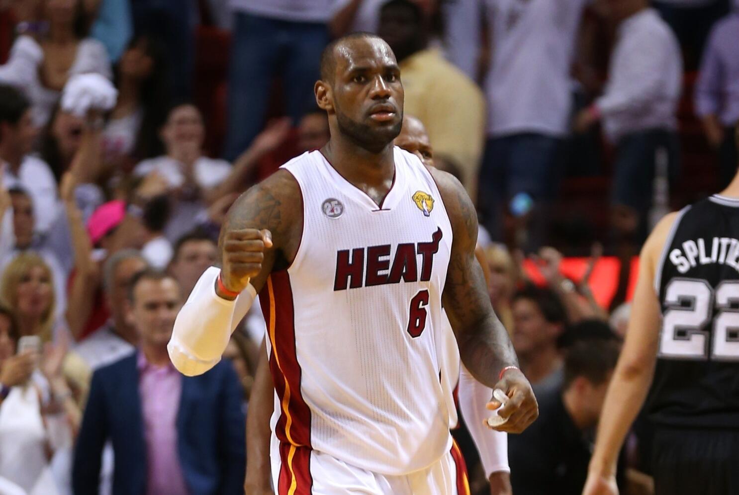A person looks at LeBron James' 2013 NBA Finals Miami Heat Game 7