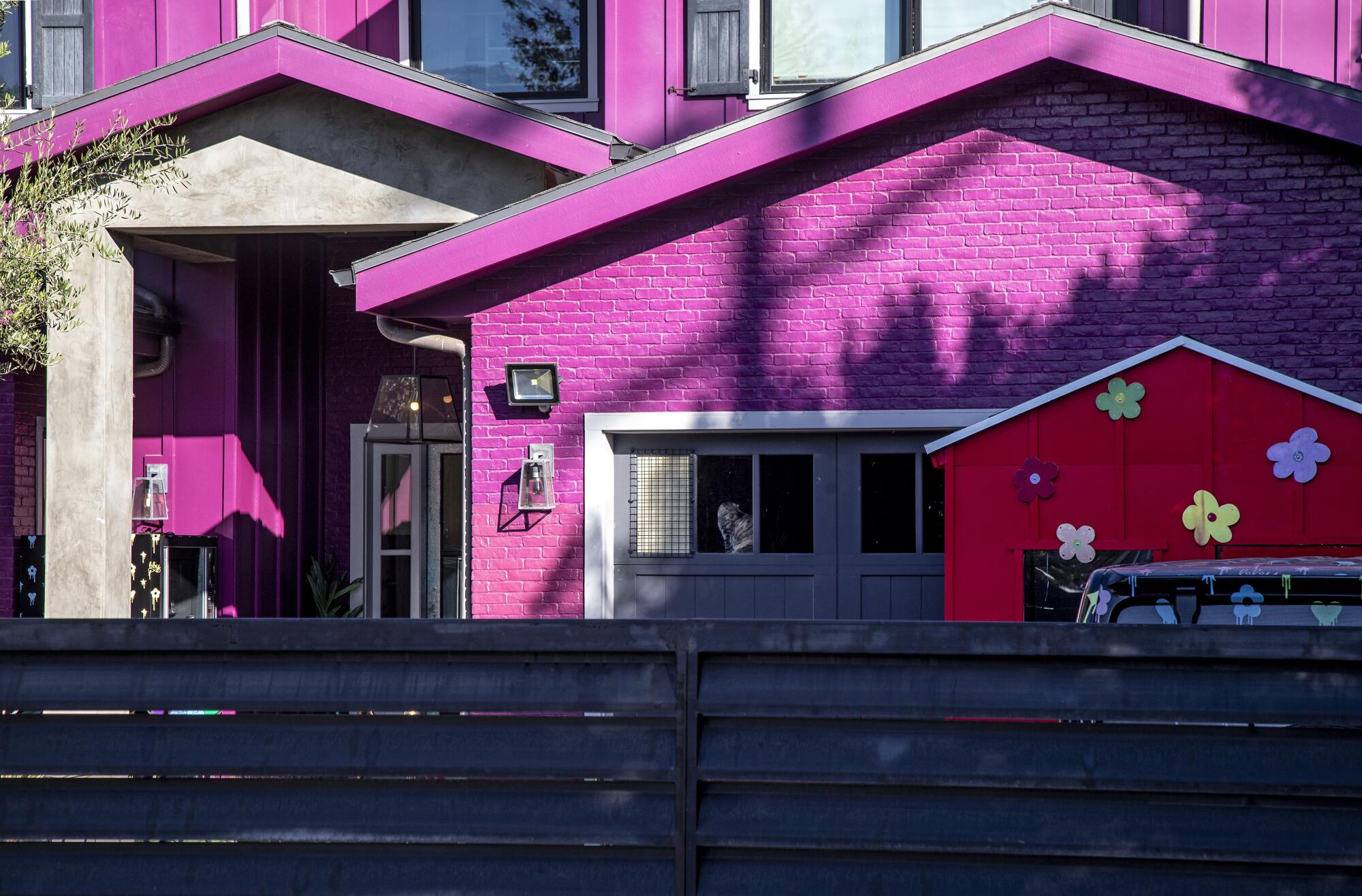 The exterior of Piper Rockelle's fuchsia-painted house.