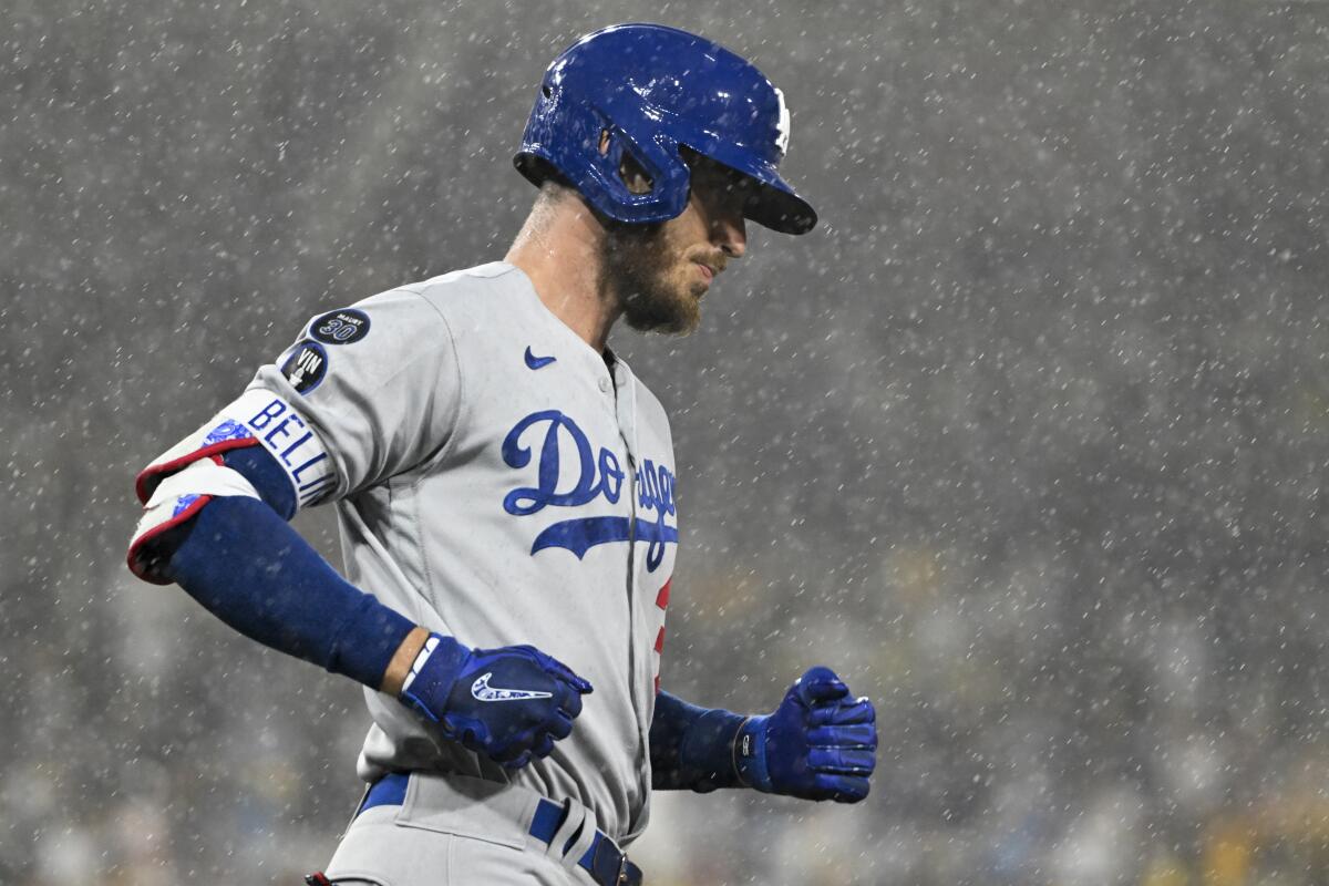 Cody Bellinger heads to first after flying out during the eighth inning in Game 4 of the NLDS on Saturday.