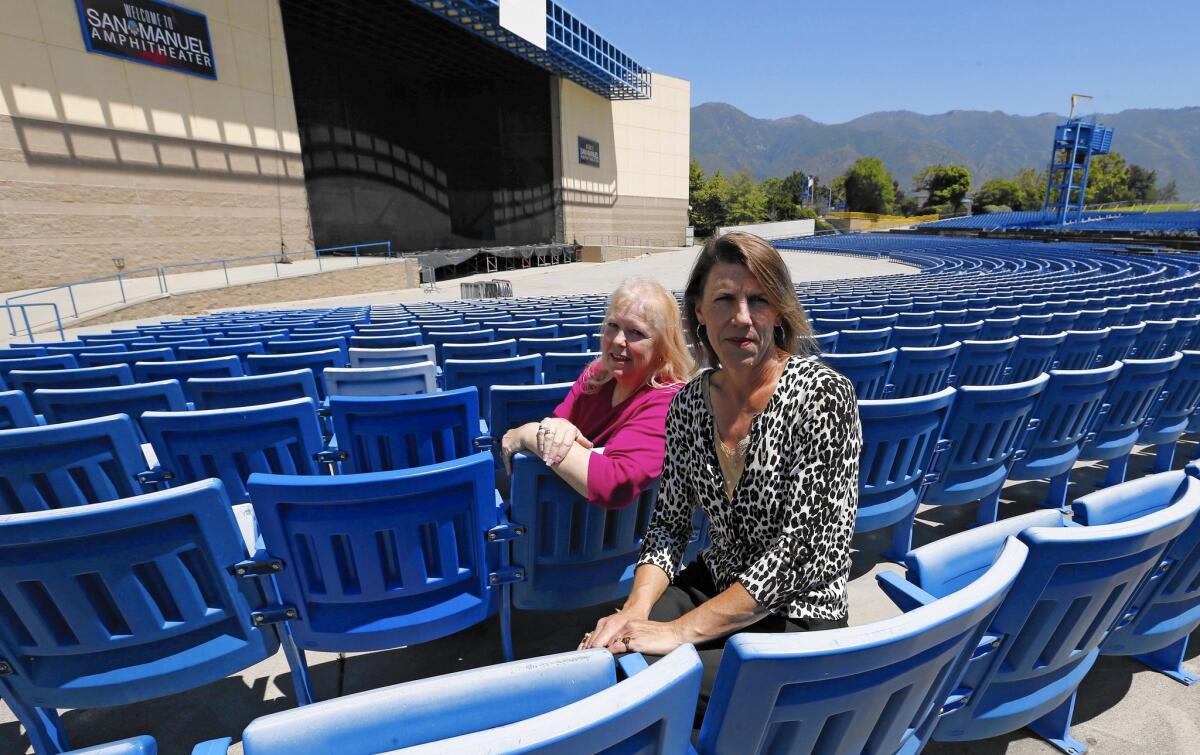 Valerie Henry, left, president of the Devore Rural Protection Assn., and Karen Slobom are pushing for an end to electronic dance events at San Manuel Amphitheater in Devore. Slobom is angry that the festivals have continued even though people died.