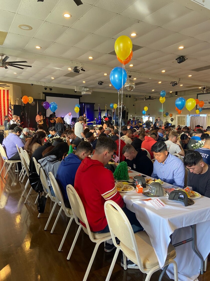 Active duty Marines from Camp Pendleton join veterans at the Super Bowl party held at American Legion Post 291, Newport Beach.