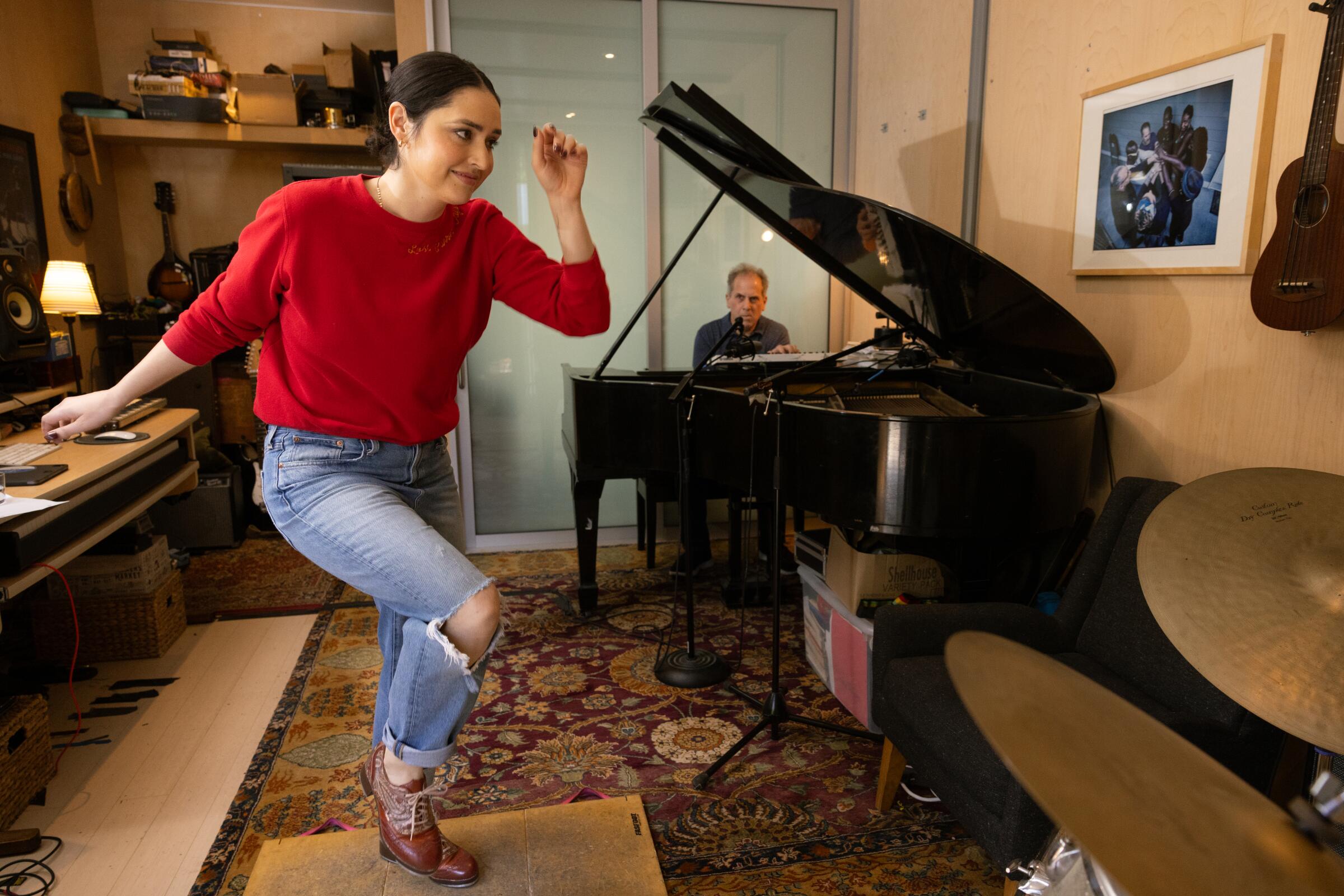 Tap dancer Melinda Sullivan and jazz pianist Larry Goldings practice their musical performance together.
