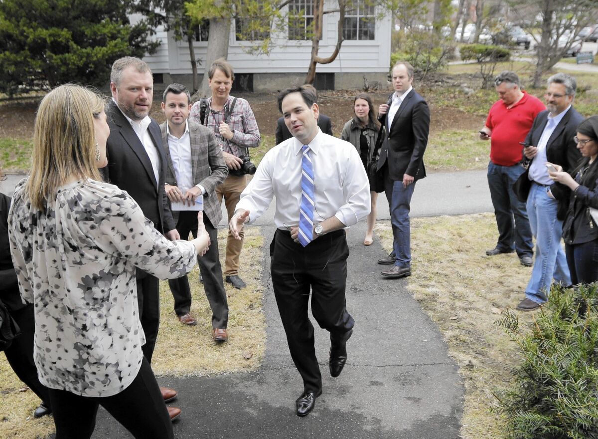 Republican presidential candidate Sen. Marco Rubio of Florida arrives at a campaign house party in New Hampshire.