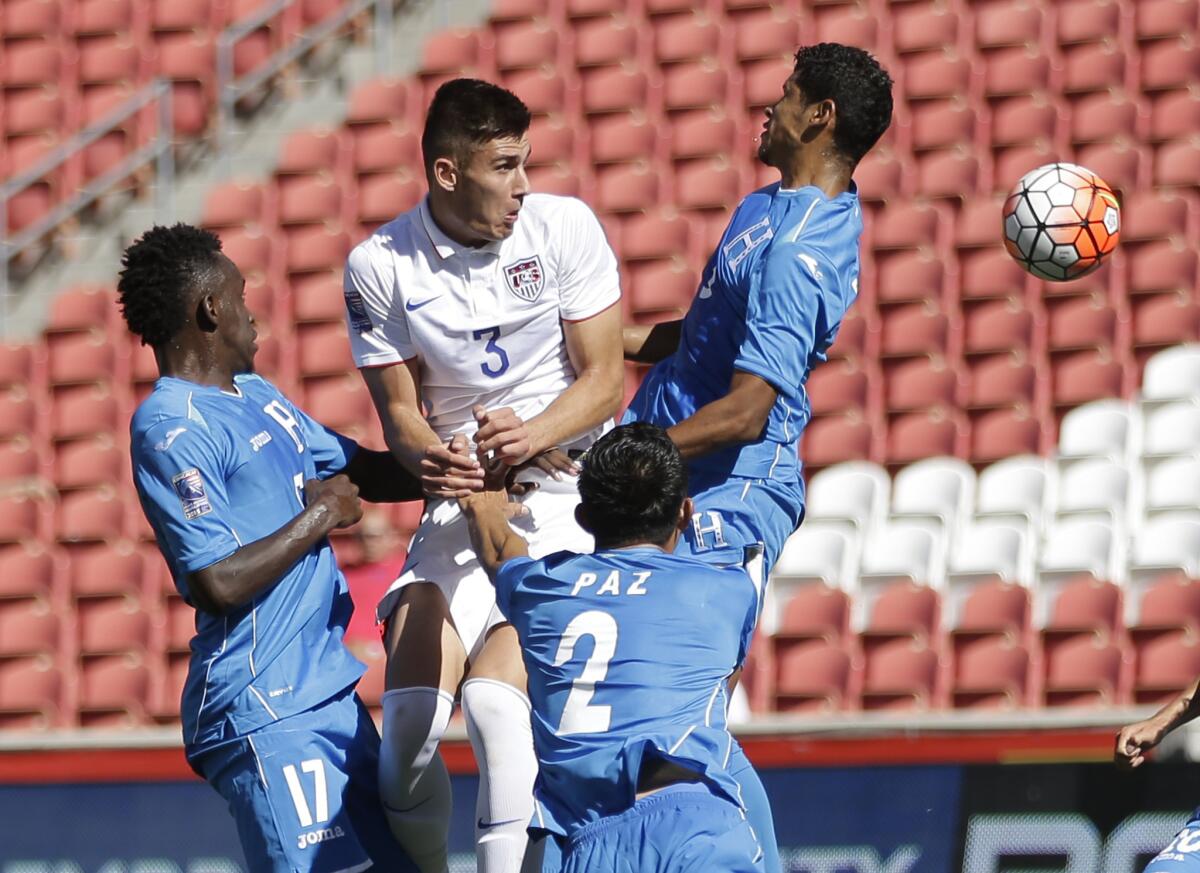 U.S. defender Matthew Miazga (3) heads the ball inside of a crowd of Honduran players during the second half of an Olmypic qualifying match on Oct. 10.