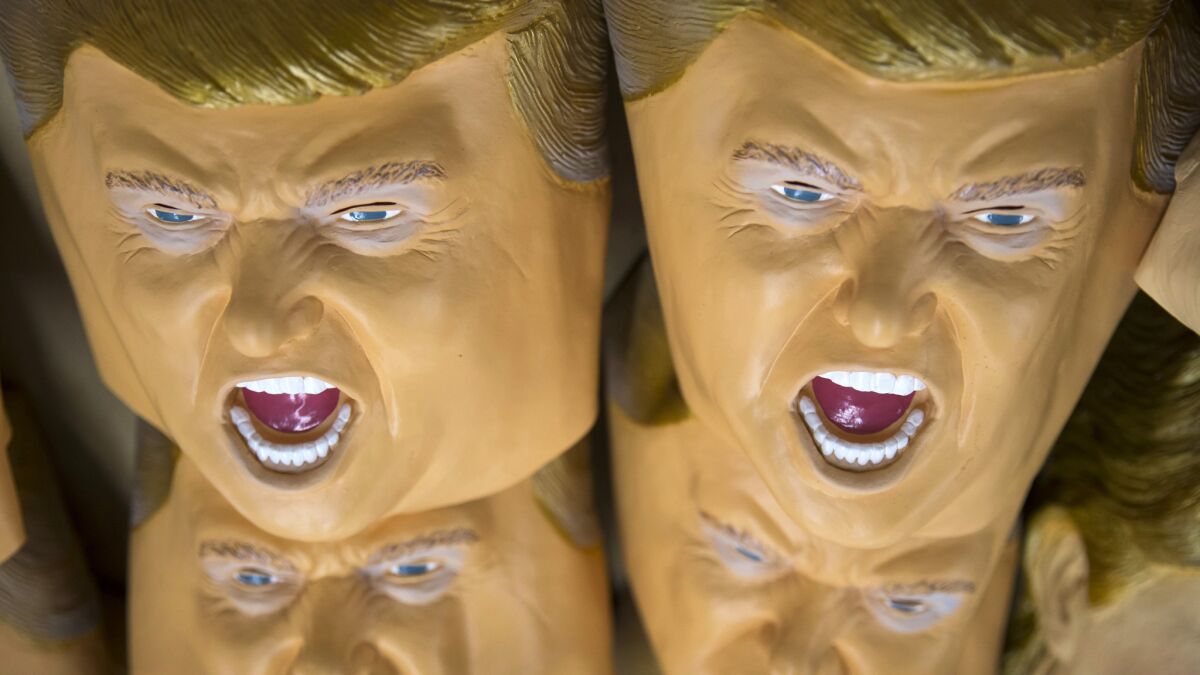 Rubber masks in the likeness of Republican presidential candidate Donald Trump at the Ozawa Studios Inc. factory in Saitama, Japan.