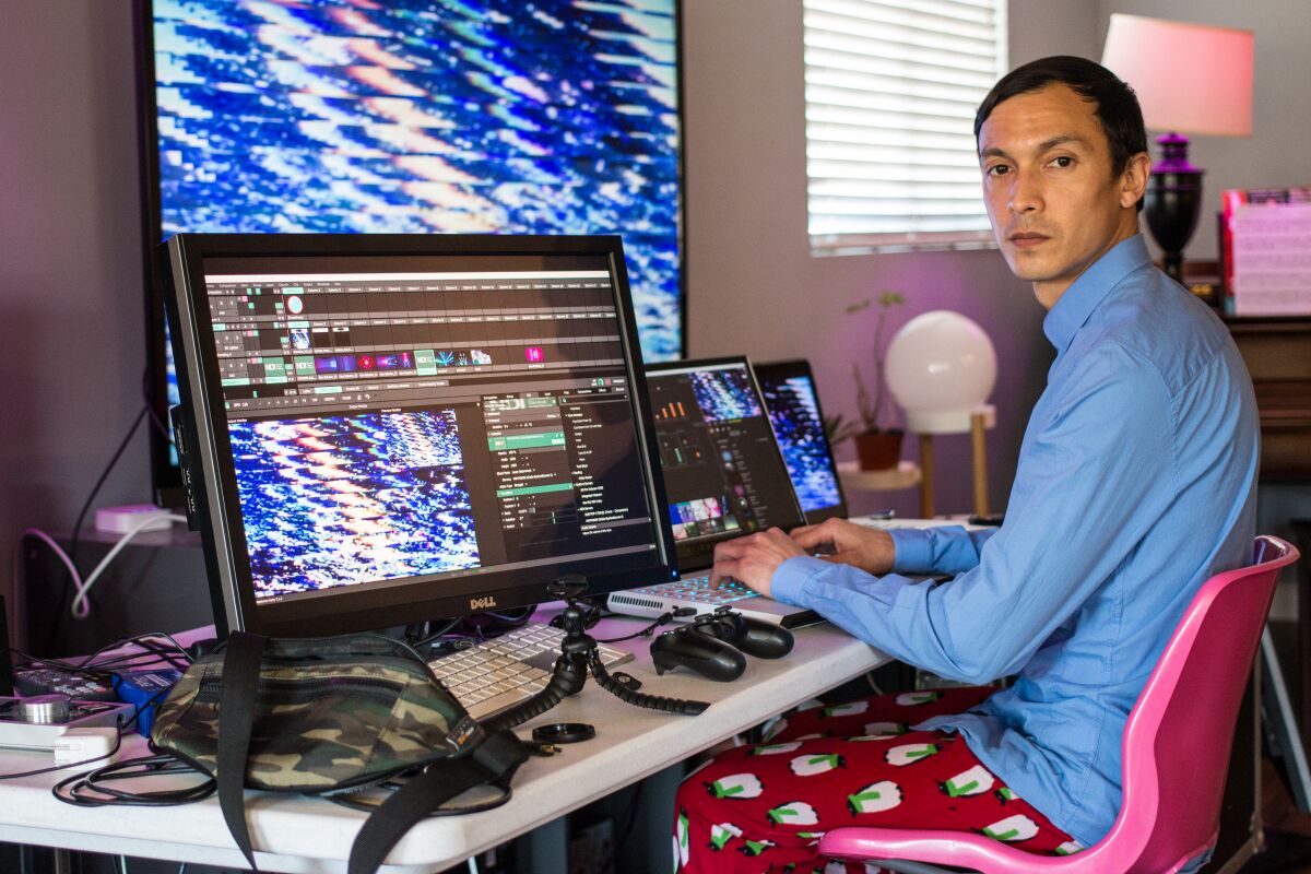 Tyler Moore, a 34-year-old audio-visual engineer, streams weekly raves from his Cypress home during the COVID-19 pandemic.