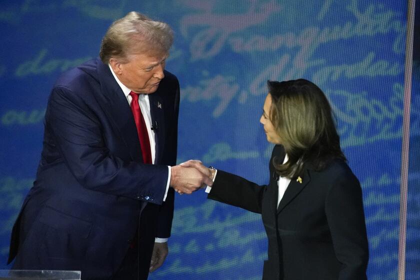 Republican presidential nominee former President Donald Trump shakes hands with Democratic presidential nominee Vice President Kamala Harris during an ABC News presidential debate at the National Constitution Center, Tuesday, Sept.10, 2024, in Philadelphia. (AP Photo/Alex Brandon)