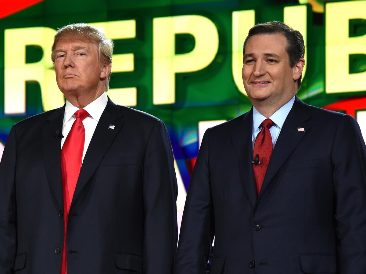 Donald Trump, left, and Sen. Ted Cruz of Texas on stage during the GOP presidential debate in Las Vegas on Tuesday night.