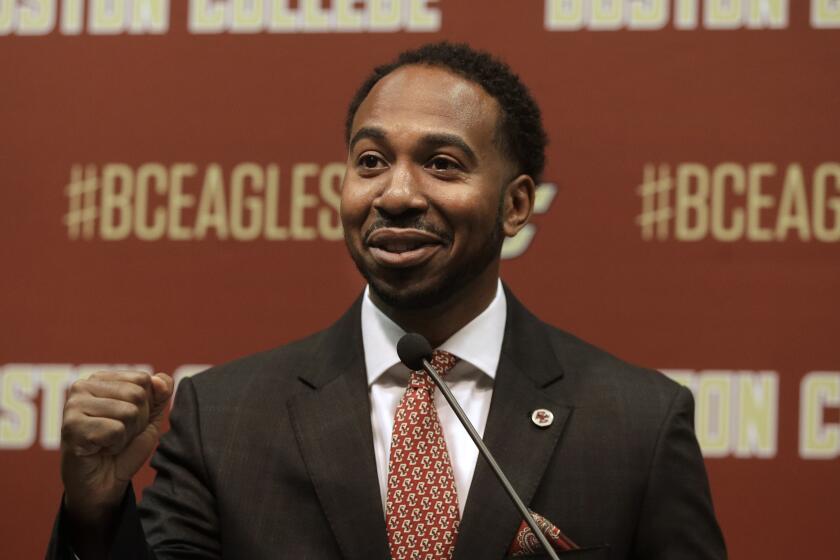 Martin Jarmond, newly hired Boston College athletic director, takes questions from members of the media Monday, April 24, 2017, during a news conference on the schools campus, in Boston. Jarmond was the deputy athletic director at Ohio State, and chief of staff for Buckeyes athletic director Gene Smith. (AP Photo/Steven Senne)