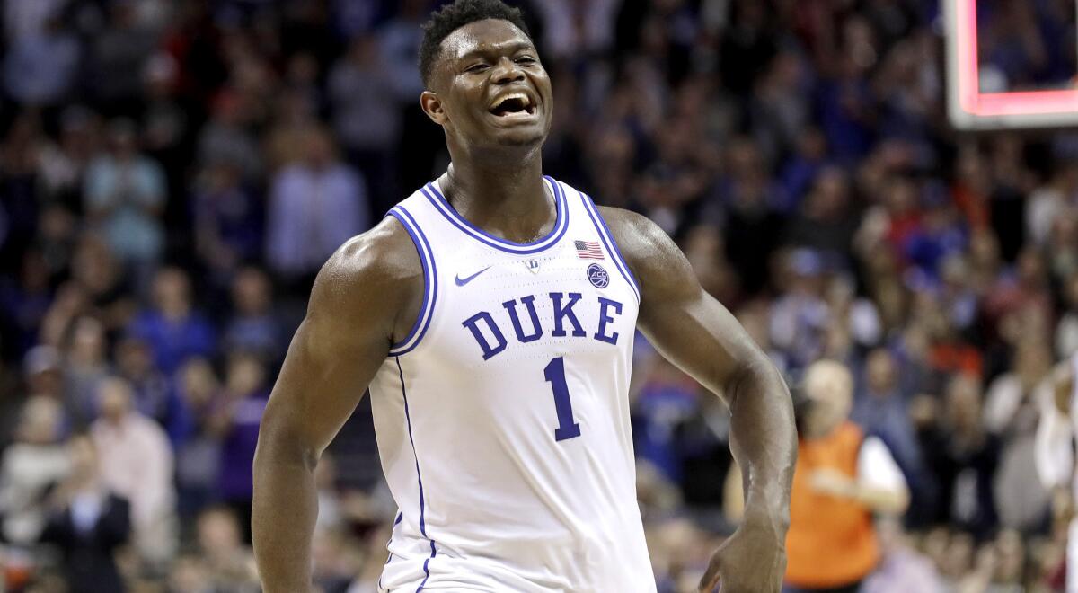 Zion Williamson celebrates after Duke defeated Florida State for the Atlantic Coast Conference tournament title Saturday.